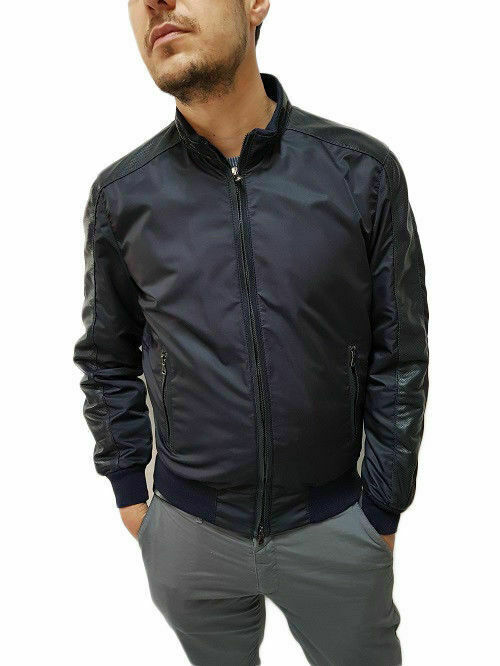 BOMBER ARTESANO PARA HOMBRES, MOD: TELA AZUL Y CHAQUETA DE PIEL PERFORADA.