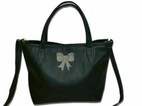 BOLSO DE MUJER EN CUERO DE COLOR NE